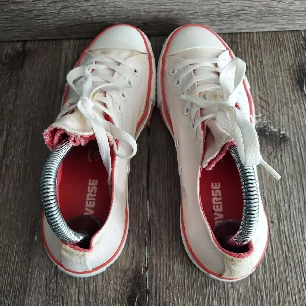 Converse sneakers off